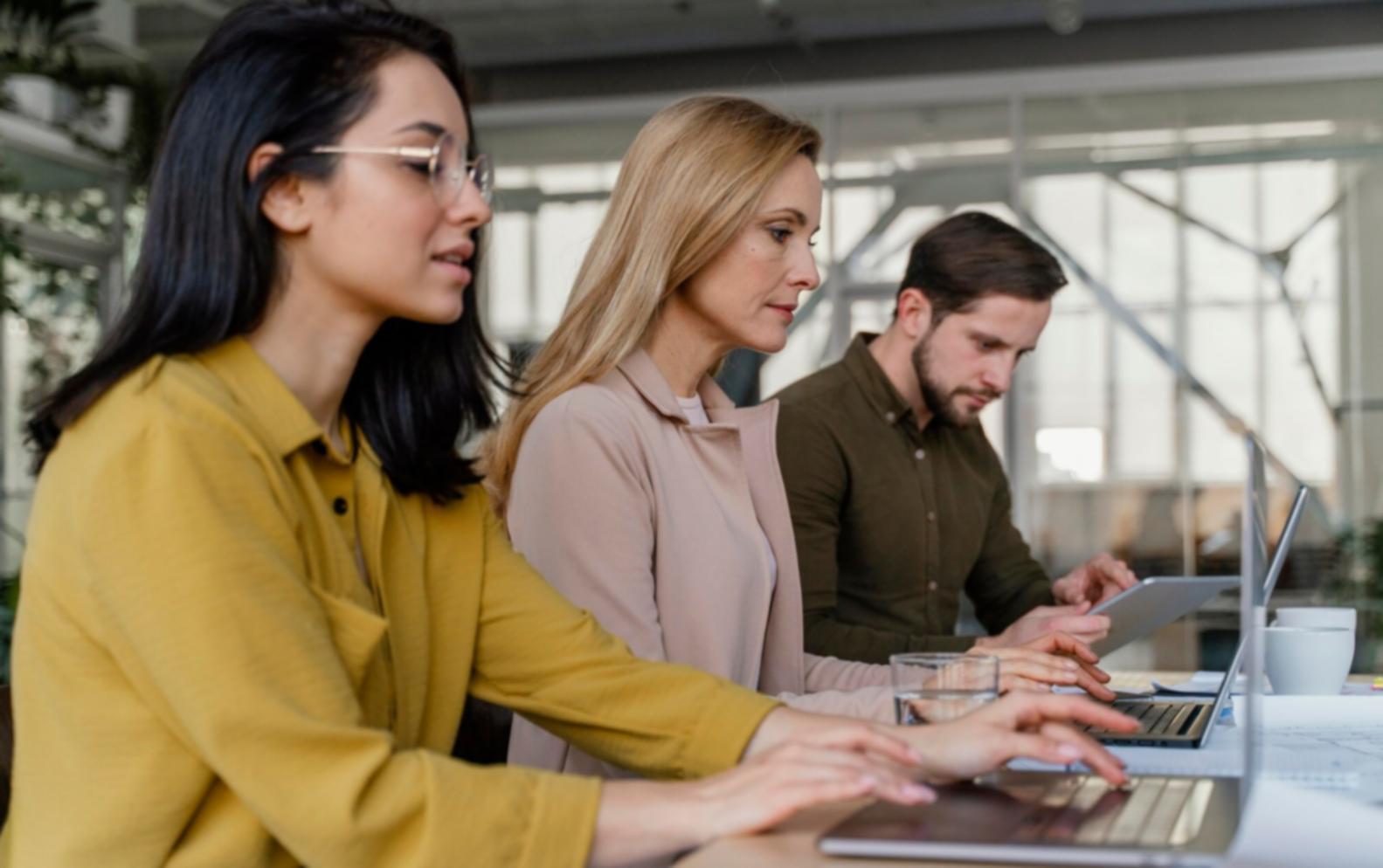 Business professionals discussing partnership strategy in modern office setting